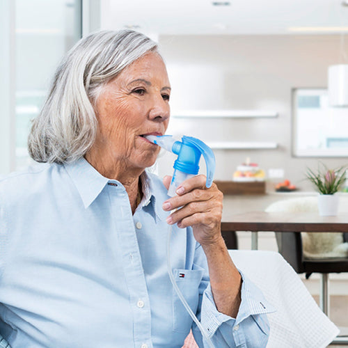 Older woman using PARI LC Sprint Reusable Nebulizer