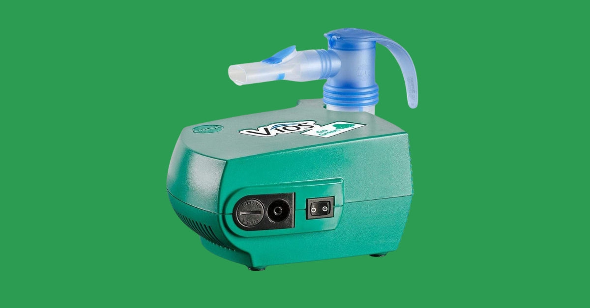 PARI Vios Go Green Nebulizer on green backdrop
