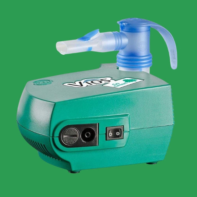 PARI Vios Go Green Nebulizer on green backdrop