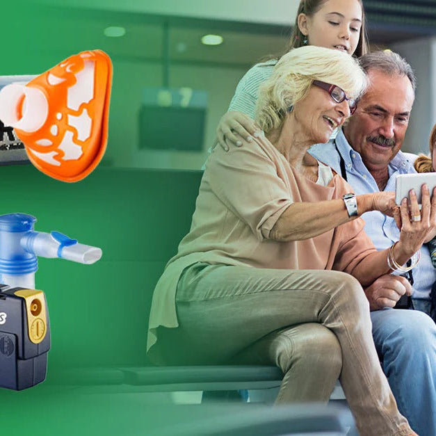 Family traveling at an airport looking at a phone with their nebulizer systems